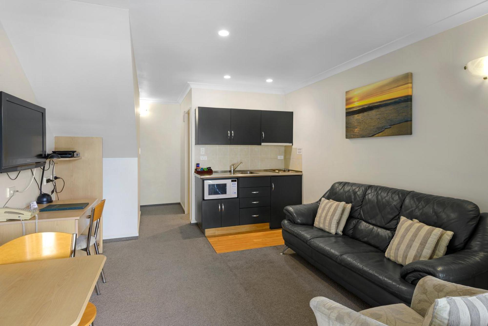 Colombo In The City Christchurch Kültér fotó A typical apartment at the hotel